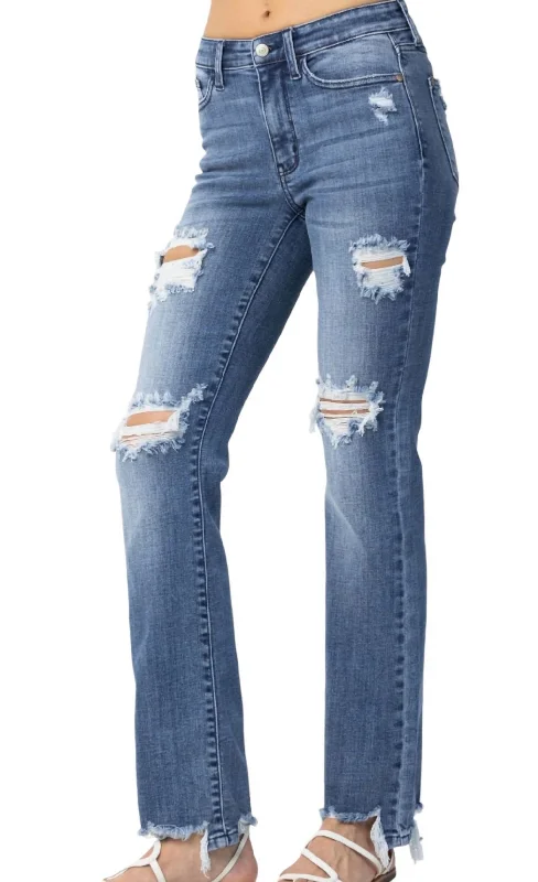 Mid Rise Destroyed Straight Jeans In Washed Denim